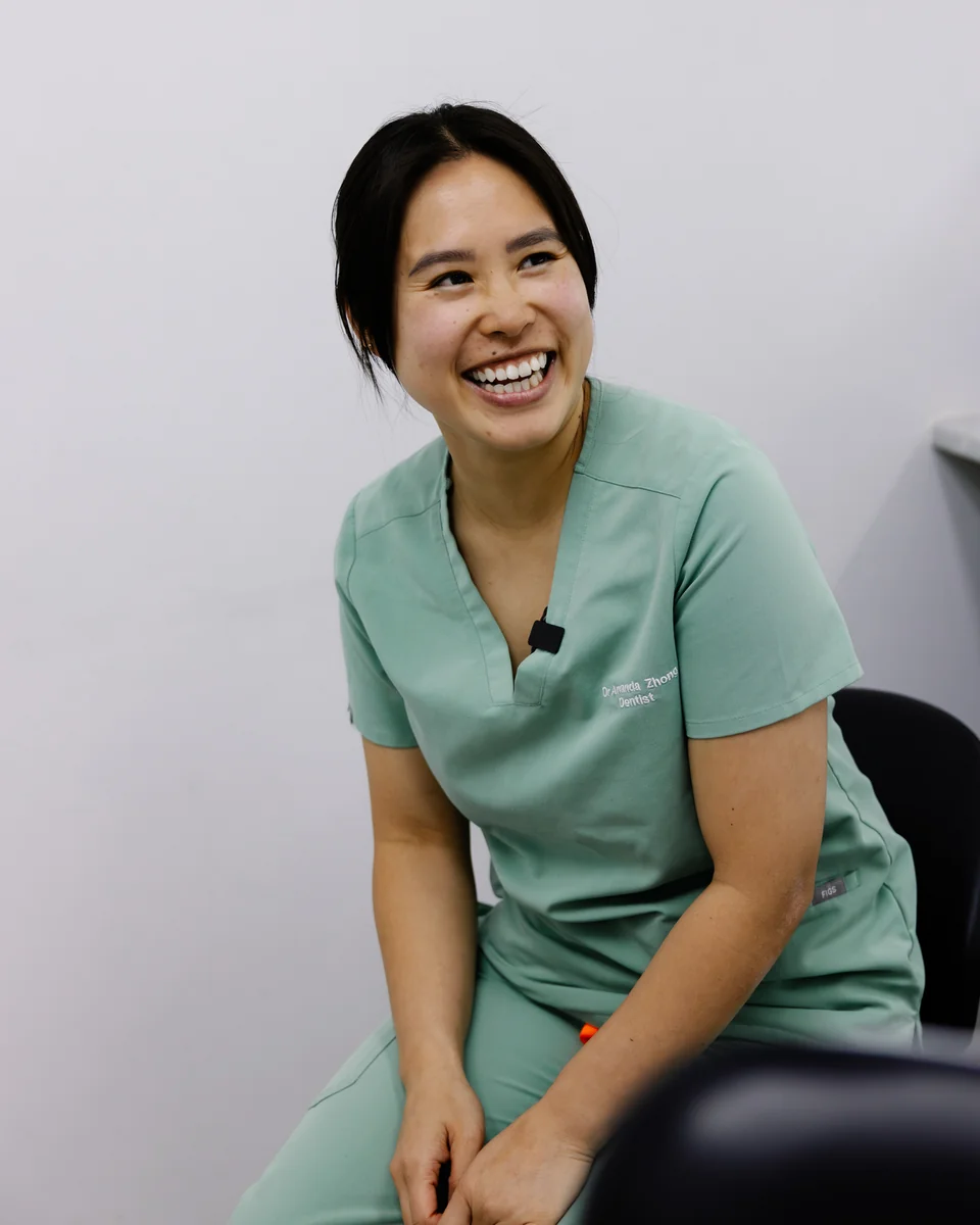 Dr Amanda Zhong laughing in the surgery