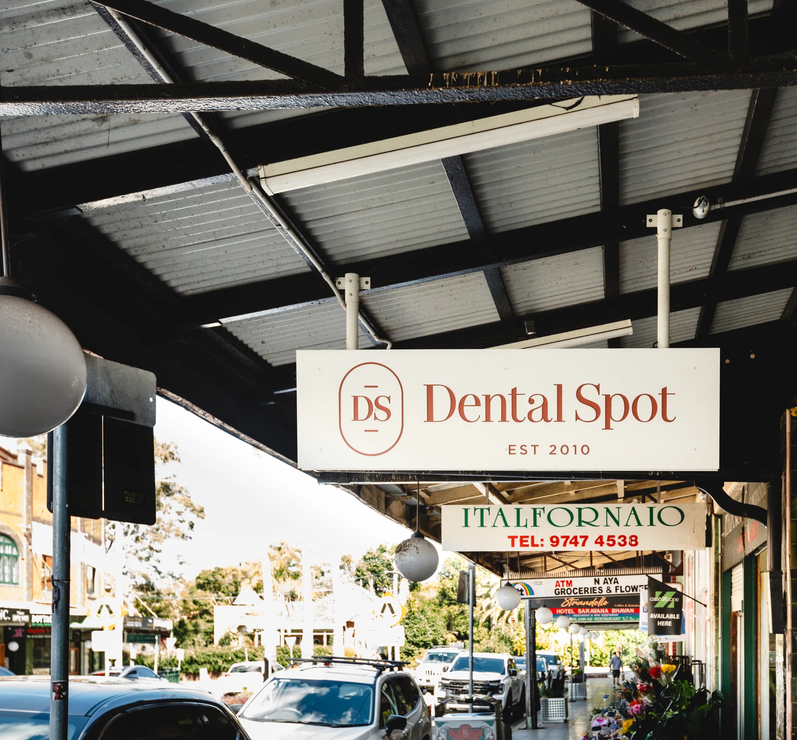 The Strand in Croydon, with the Dental Spot sign hanging over the footpath
