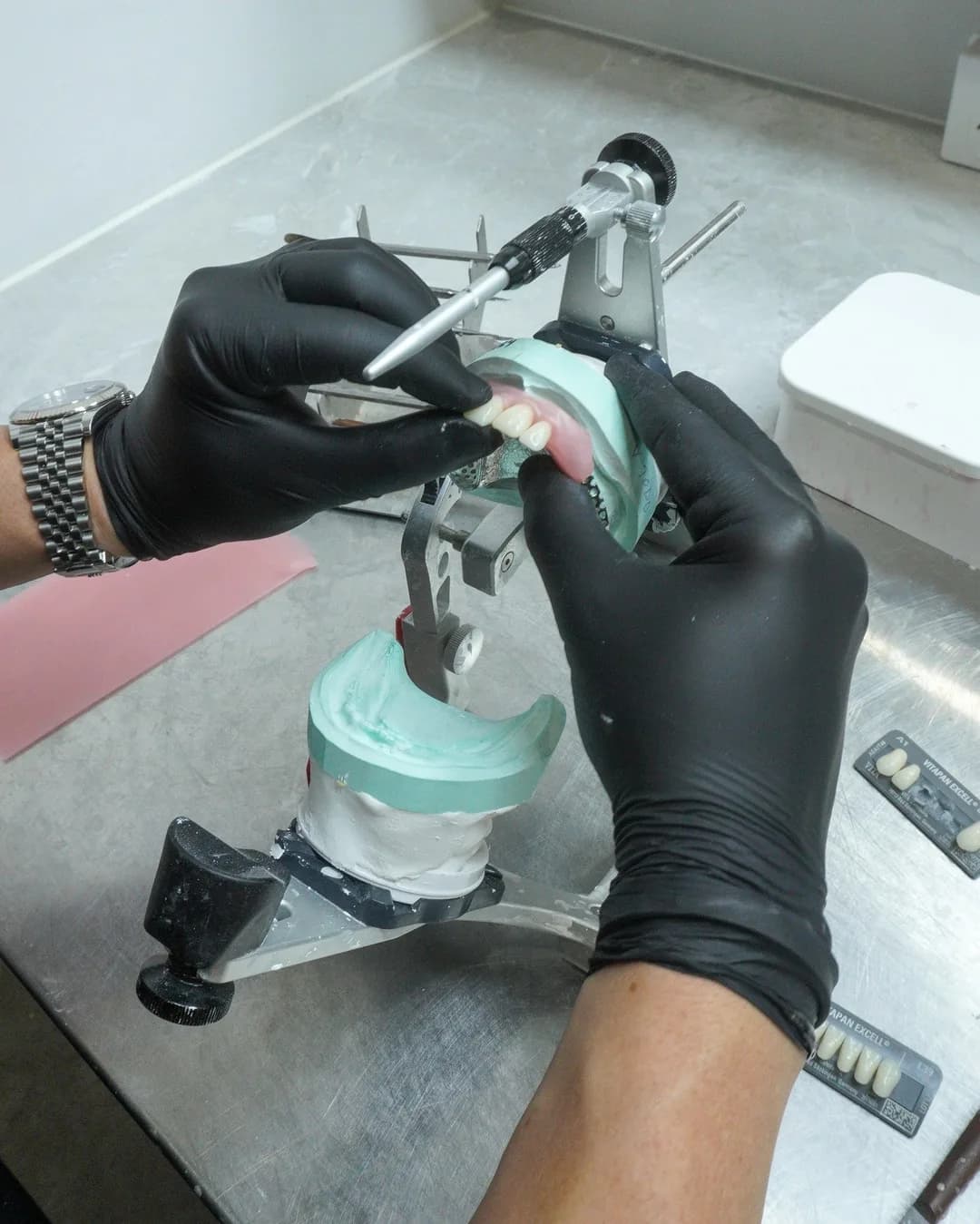 A technician working on a model in the Dental Spot lab