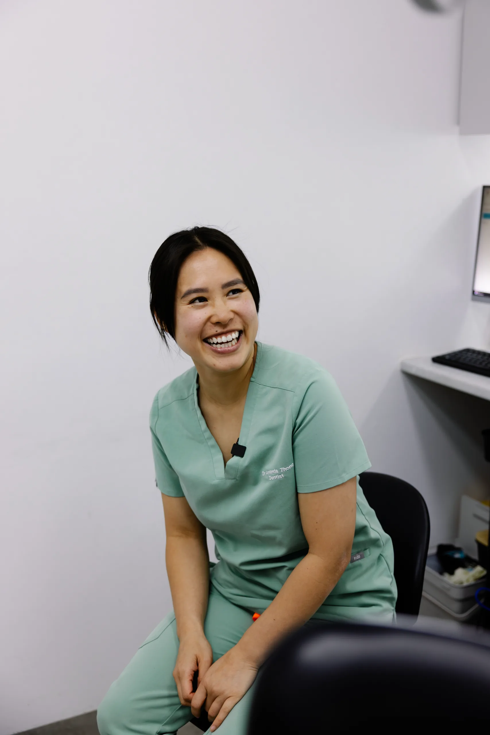 Dr Amanda Zhong laughing in the surgery