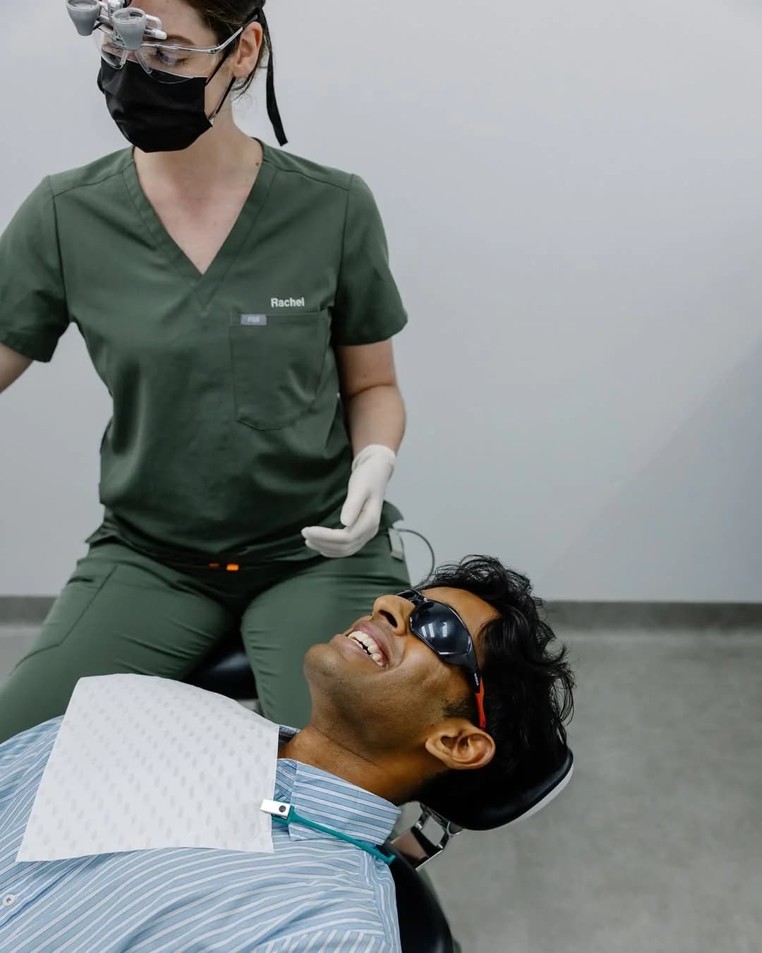 Dr Rachel Brown with a laughing patient in the dental chair
